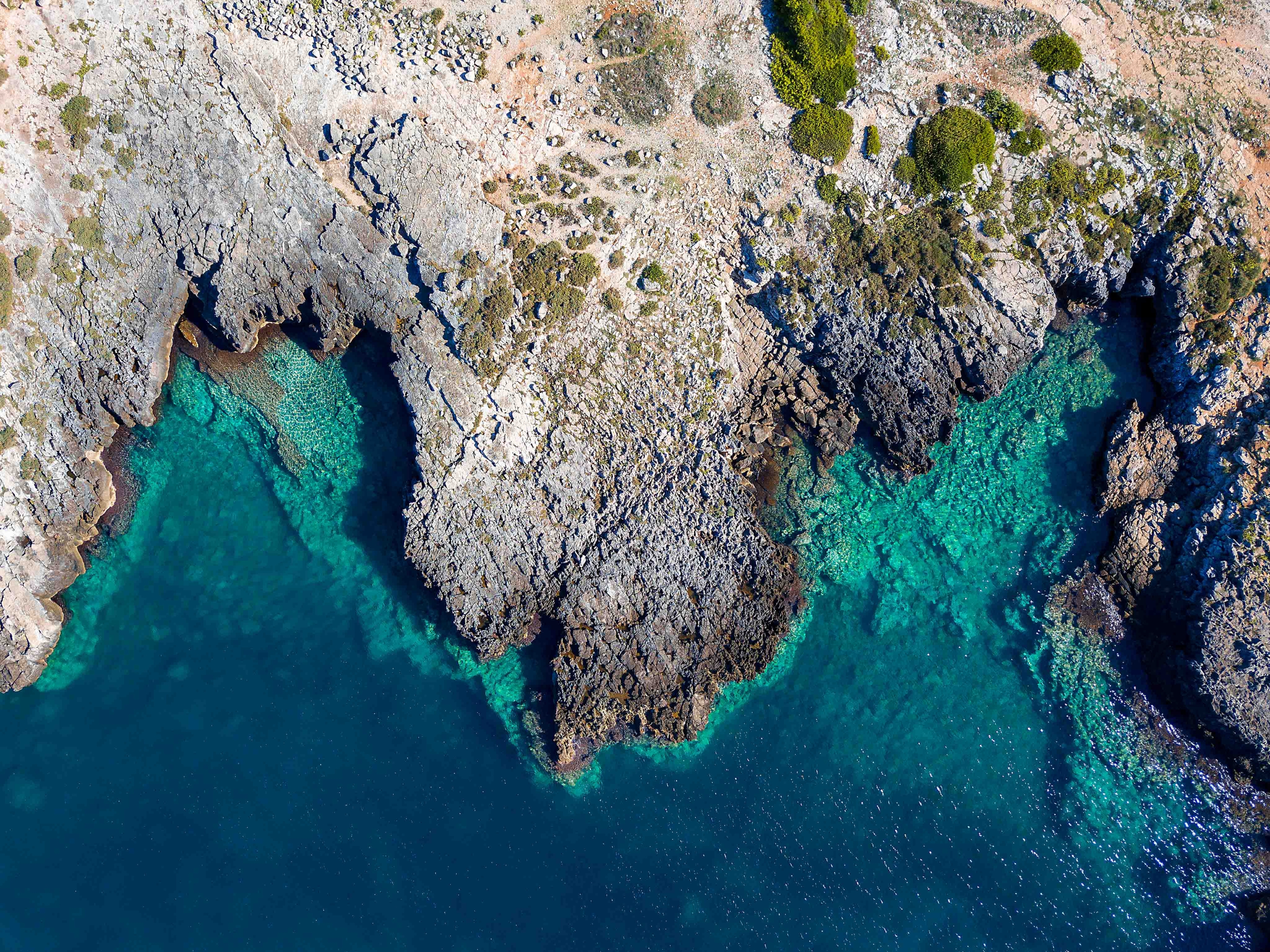 Salento from above: limestone, clear water and the Mediterranean